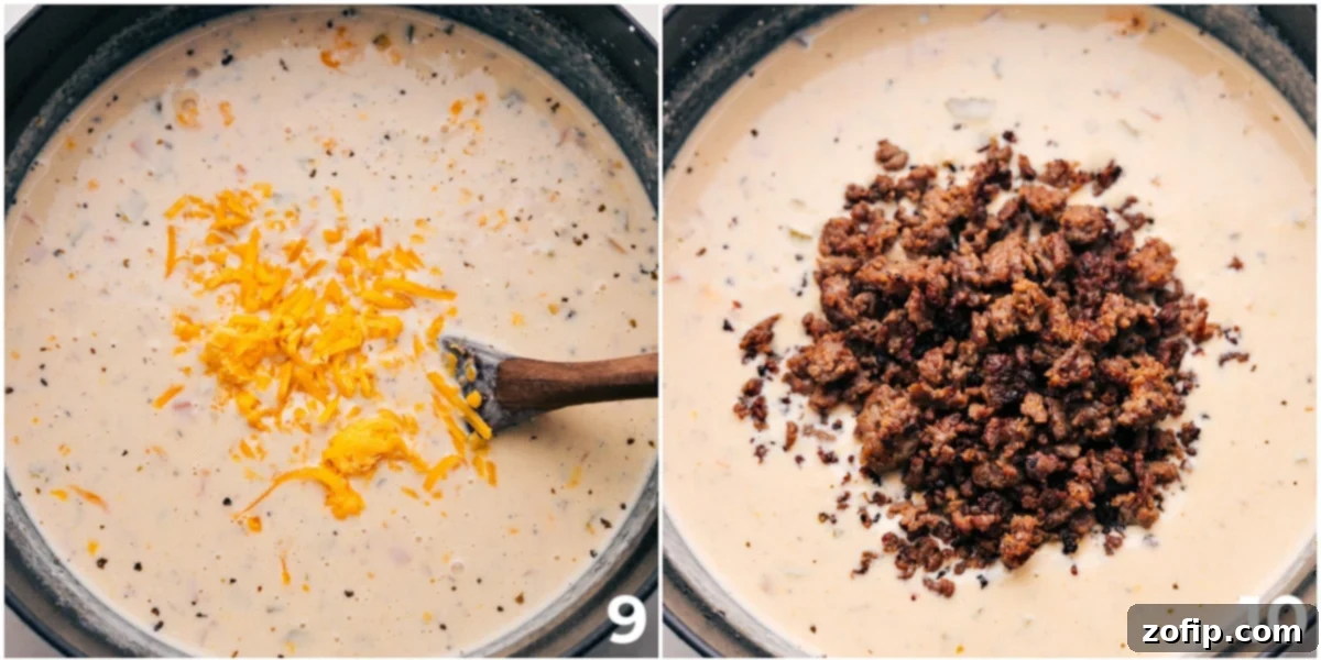 The final stages of making creamy Sausage Potato Soup, showing the addition of freshly shredded extra-sharp Cheddar cheese and the return of browned Italian sausage to the pot, creating a rich, hearty, and flavorful dish.