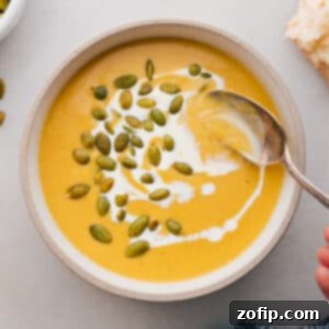 Butternut Squash Soup in a bowl with a spoon