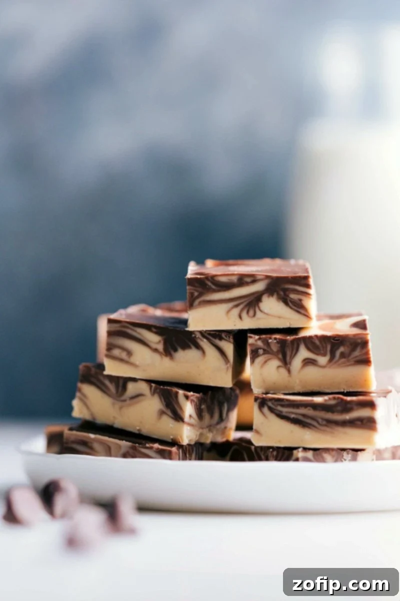 Decadent Tiger Butter Fudge Stacks - Ready to Satisfy Your Sweet Tooth Stacked slices of tiger butter fudge with distinctive chocolate and peanut butter swirls.