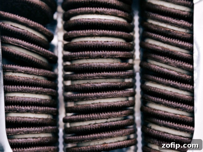 Decadent Chocolate Dipped Oreos 4 Overhead shot showcasing a variety of Oreo cookie types, including original, double stuf, and golden, laid out for dipping