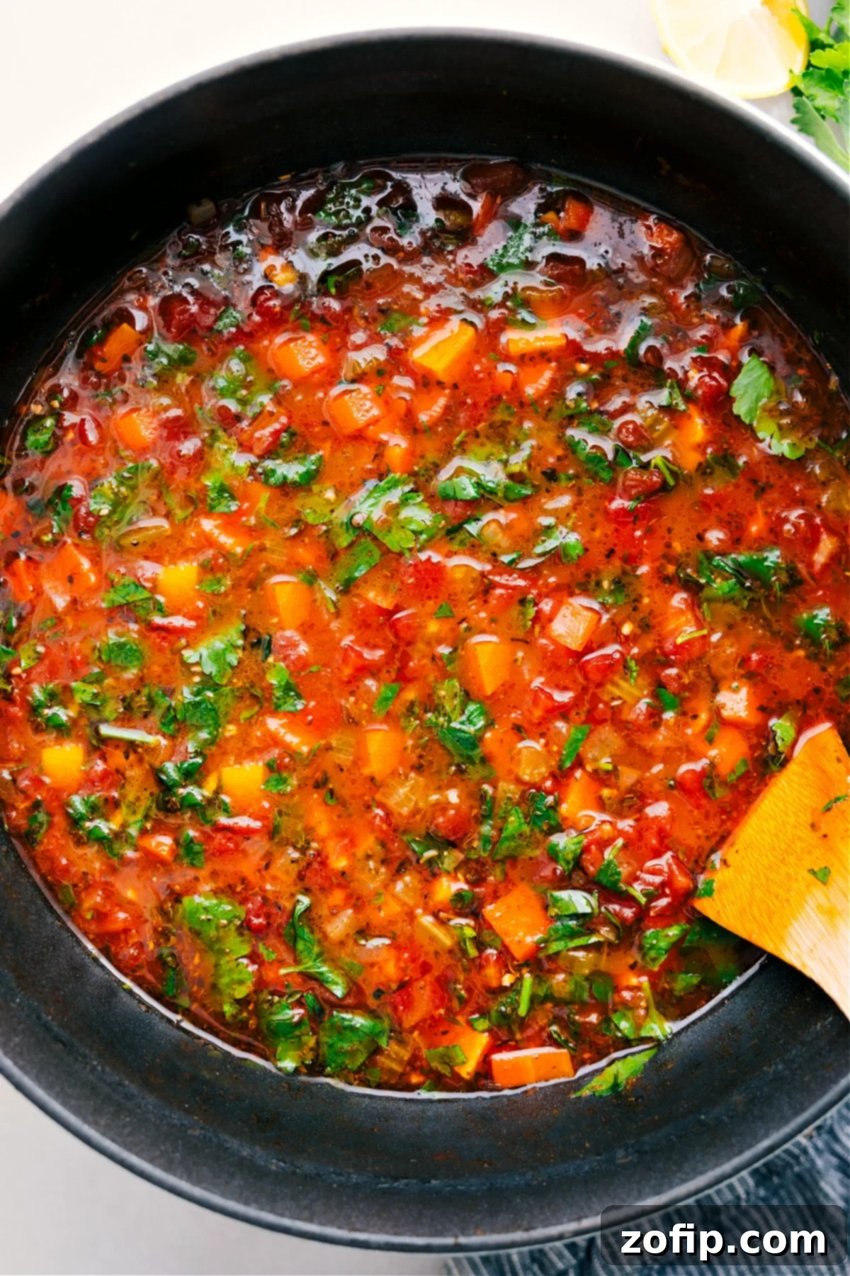 The Best Vegetable Soup Recipe: A Secret Ingredient Revealed A pot of hearty vegetable soup, steaming and ready to be served, showcasing vibrant colors and rich texture.