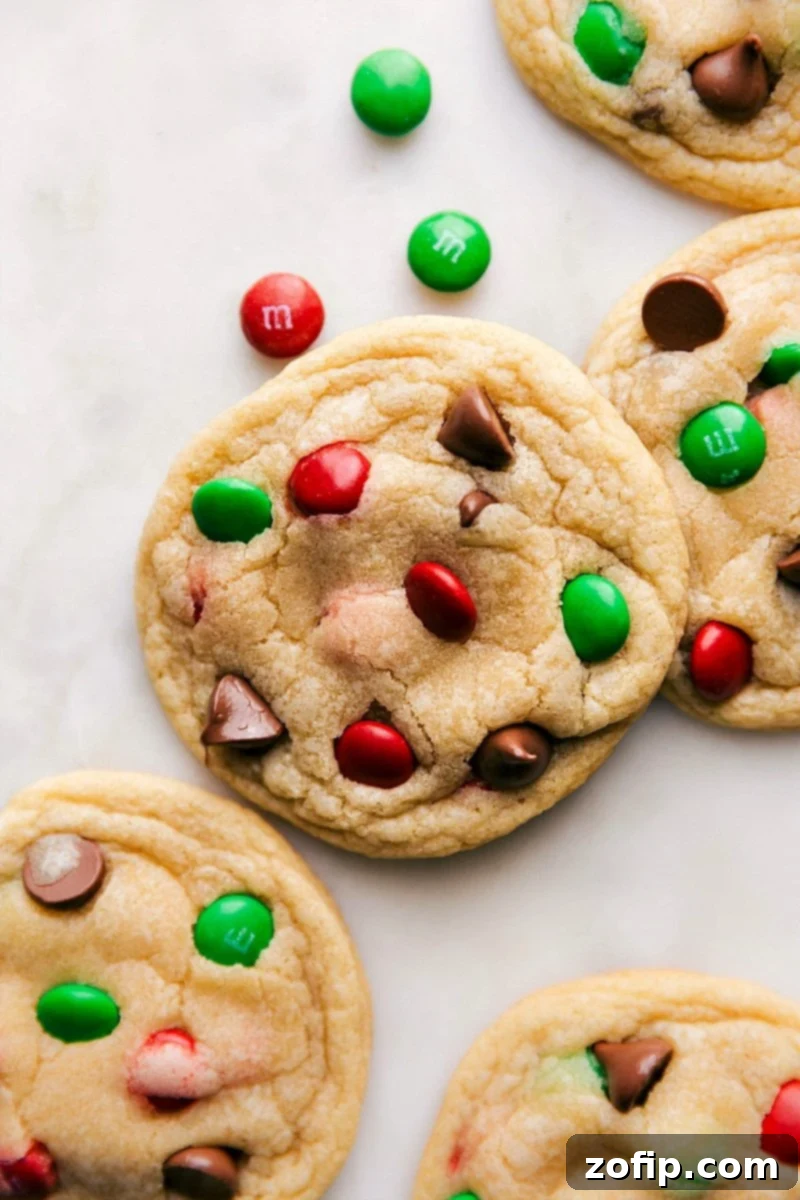 Perfectly baked Santa Cookies resting on a cooling rack, ready to be placed on a 'cookies for Santa plate' alongside a glass of milk.