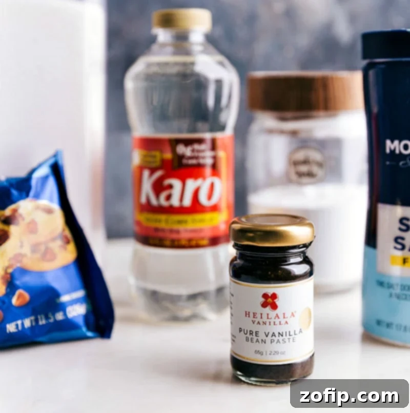 All essential ingredients for Honeycomb Candy laid out: light corn syrup, granulated sugar, baking soda, salt, and vanilla extract.