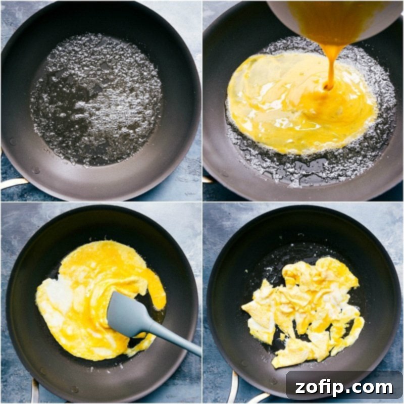 Cooking Egg for Fried Rice Recipe Preparation Cracked egg sizzling in a hot pan with melted butter, being gently cooked and scrambled for inclusion in a delicious fried rice recipe.