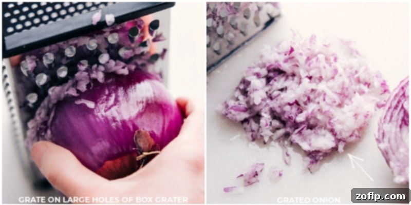 Close-up image of a red onion being grated over a bowl, a key step in preparing Greek Meatballs.