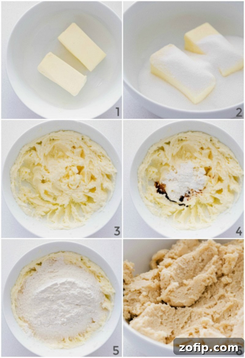 Close-up of a hand mixer creaming butter and sugar together in a bowl, preparing the cookie dough base.