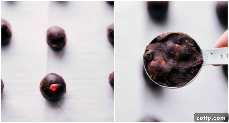 Making Valentine Cookies: Measuring Dough and Rolling onto Sheet Pan Measuring cookie dough and rolling it onto the sheet pan for baking.