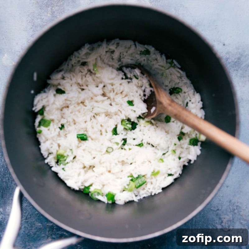 Close-up of fluffy coconut rice, ready to be used as a filling for vegetarian lettuce wraps.