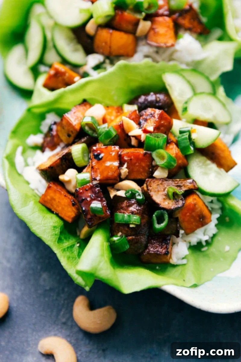 A perfectly assembled, healthy vegetarian lettuce wrap, ready for a delicious bite.