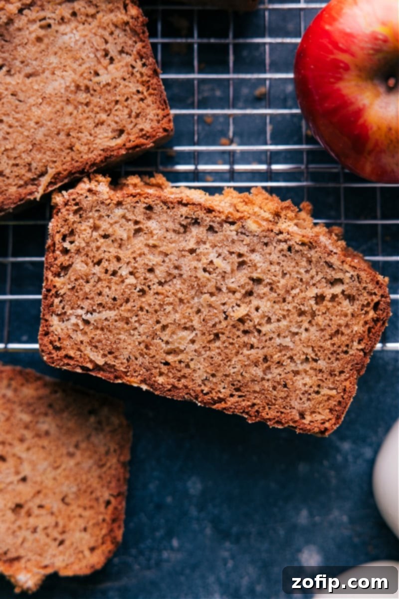 Overhead image of the perfectly baked apple bread loaf, golden brown and inviting.