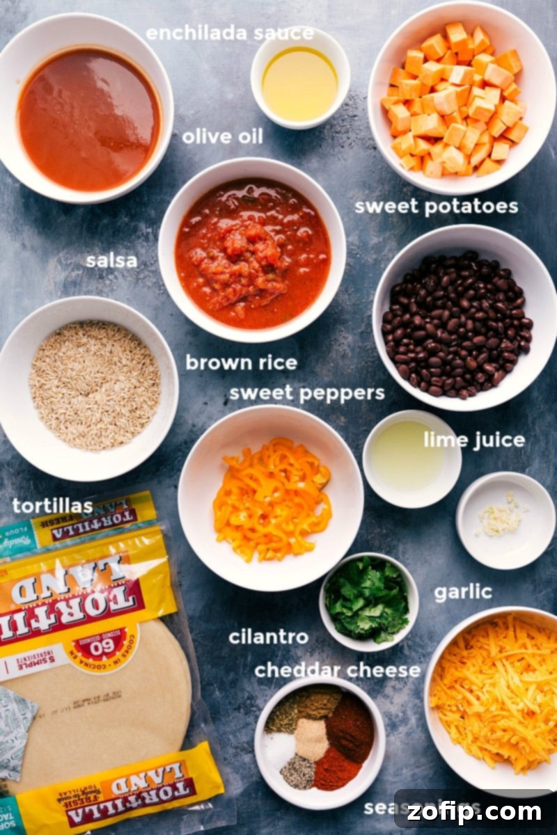 A vibrant display of fresh ingredients for sweet potato black bean enchiladas, including diced sweet potatoes, bell peppers, black beans, salsa, and tortillas.