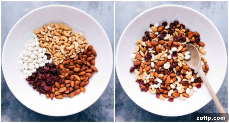 Ingredients for a healthy trail mix, such as walnuts, pecans, dried cherries, pistachios, pepitas, sunflower seeds, cocoa-roasted almonds, and coconut chips, being combined in a large bowl.