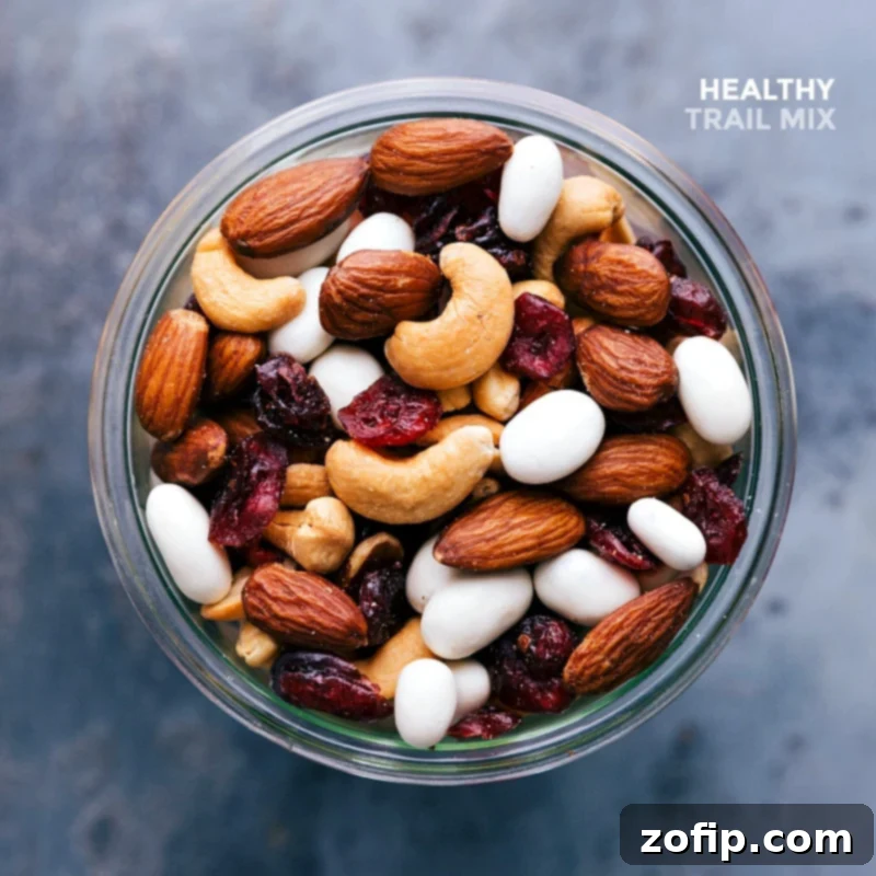 A completed snack, a blend of nuts, seeds, and dried fruits, ready for healthy snacking.