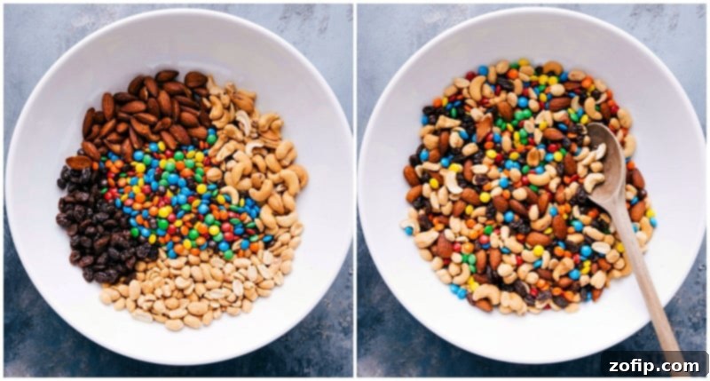 Ingredients for mountain trail mix, such as M&M's, sunflower seeds, chocolate-covered popcorn, dark chocolate chunks, and pecans, being stirred together in a bowl.