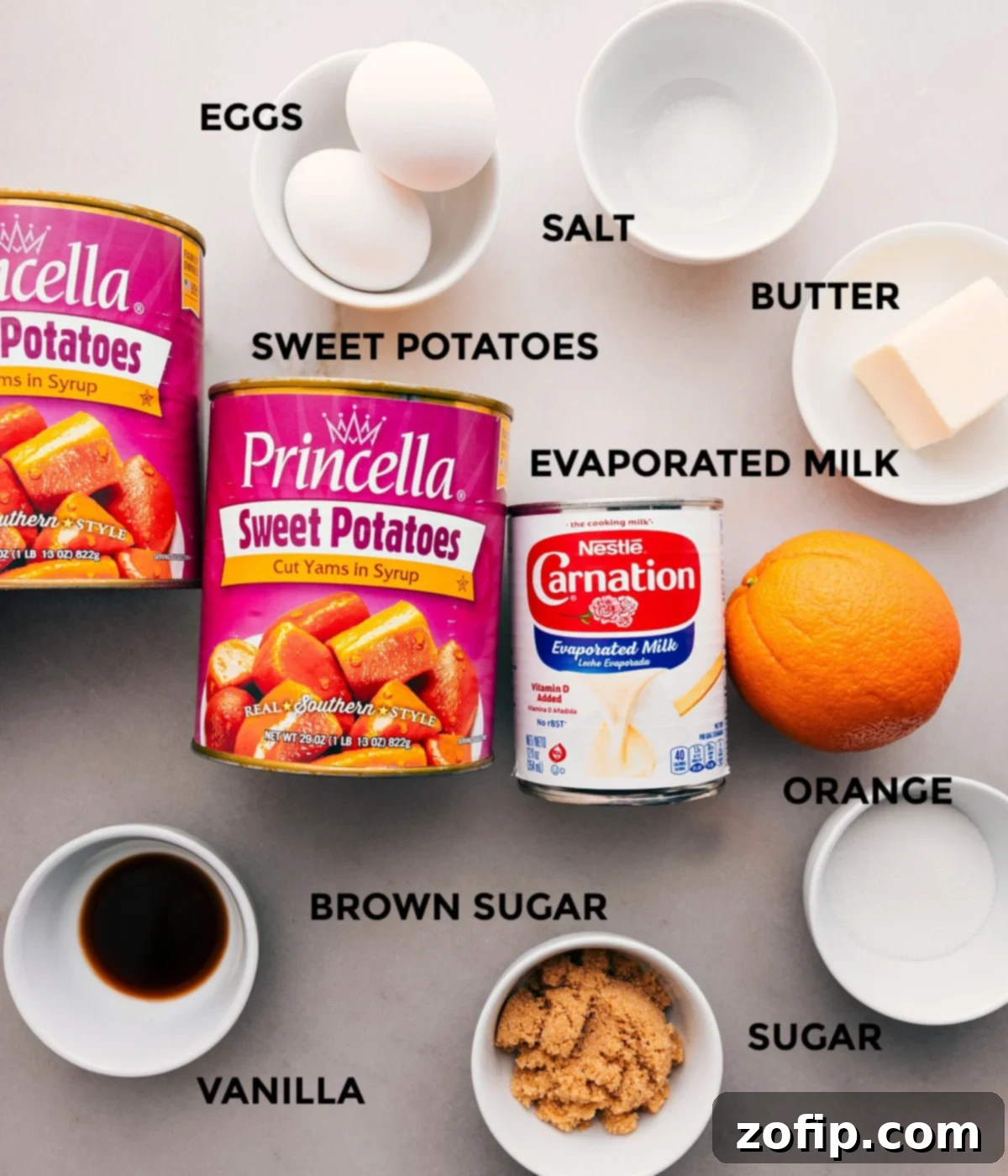 This recipe includes sweet potatoes, eggs, salt, butter, evaporated milk, orange juice, sugar, and vanilla extract as main ingredients.