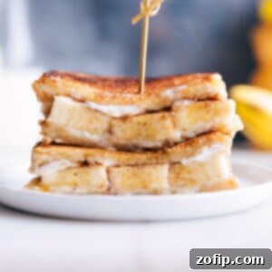 Honeyed Bliss 2 A delicious grilled honey and banana sandwich cut in half.