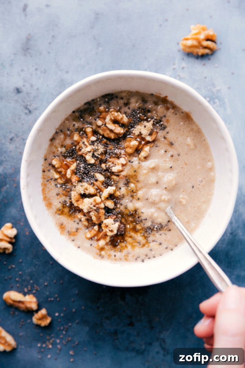 Maple Brown Sugar Oatmeal: A Warm and Inviting Breakfast Treat A comforting bowl of maple brown sugar oatmeal, elegantly garnished, perfect for a cozy breakfast.
