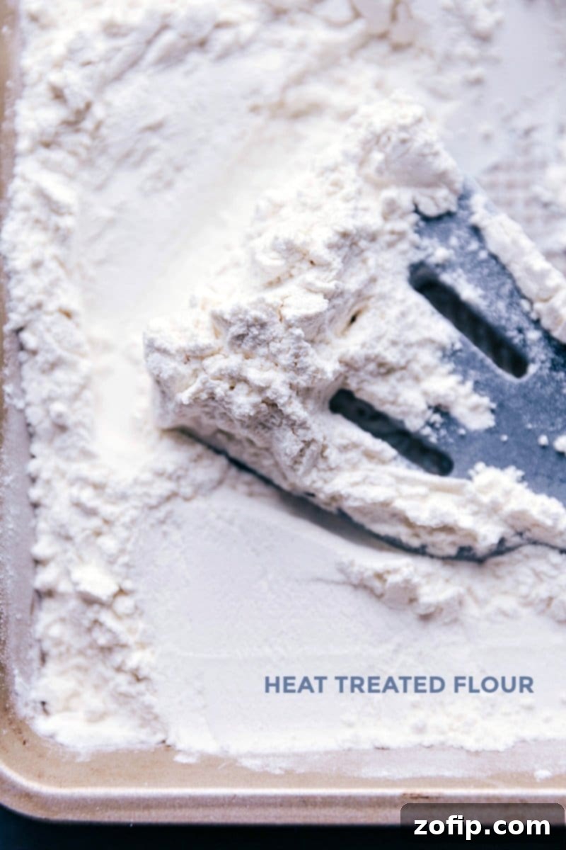 How to heat-treat flour on a baking sheet to ensure it's safe for no-bake recipes.