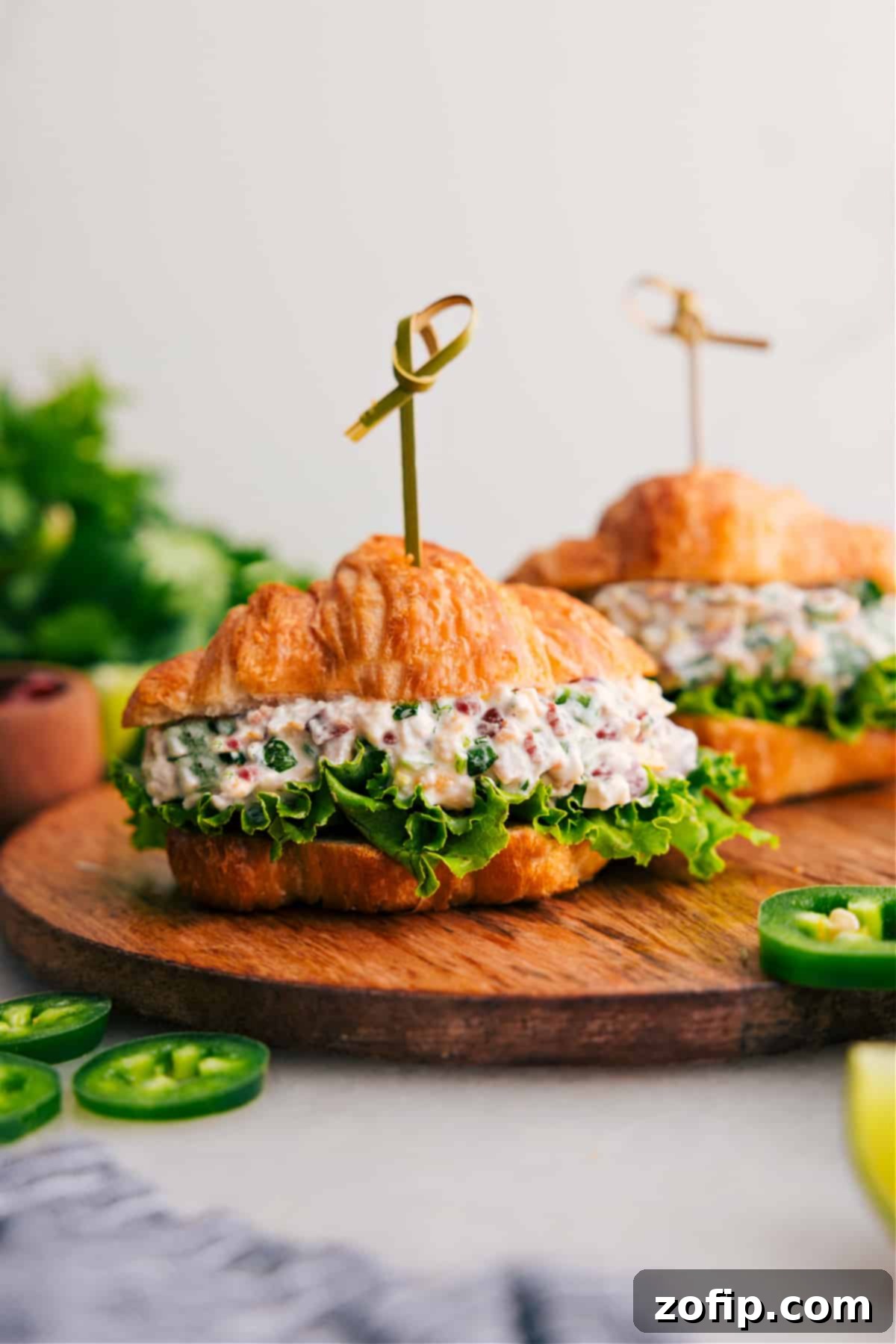 Jalapeño Popper Chicken Salad in a croissant is ready for you to enjoy.