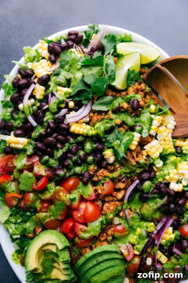 Chicken Taco Salad bursting with colorful, nutritious ingredients.