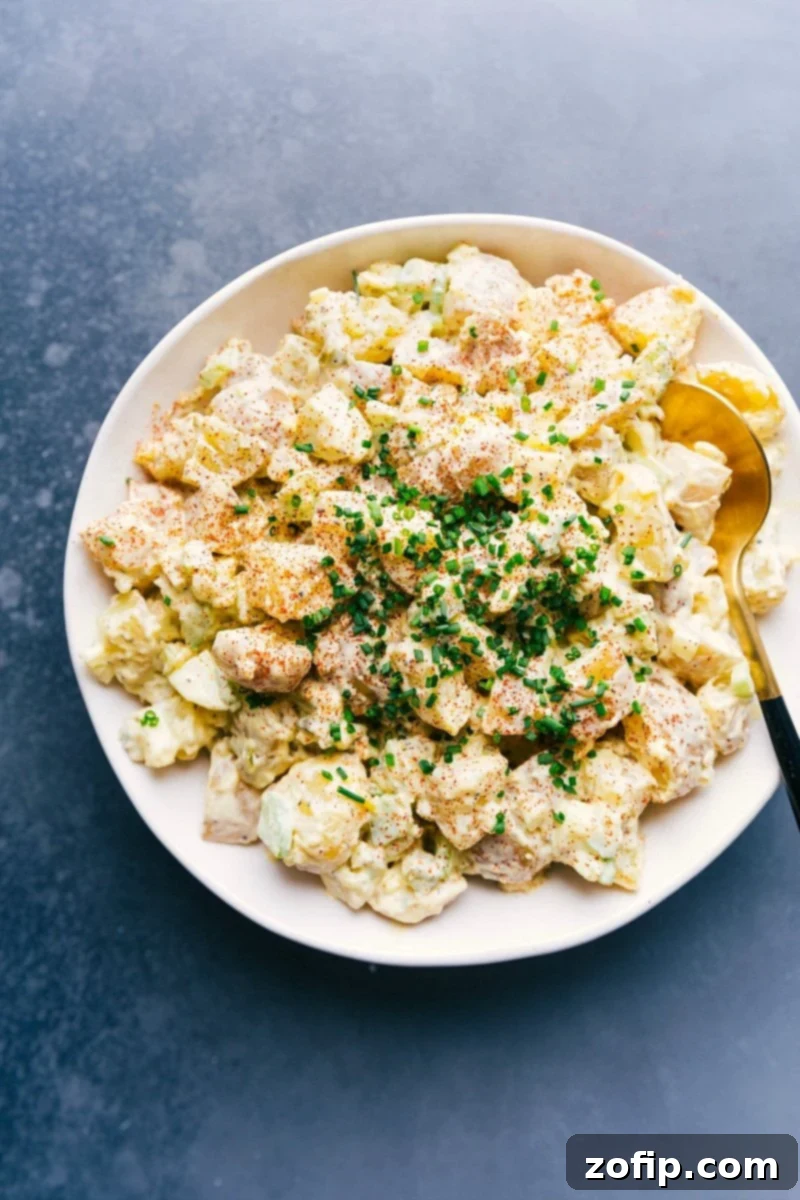 Creamy Dressed Potato Salad - Richly Coated and Ready to Serve Fully dressed dish coated in a rich, creamy dressing.