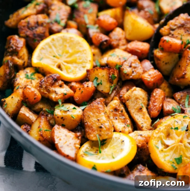 A healthy, fresh, and flavorful one-skillet meal - Lemon Chicken and Potatoes, perfectly cooked. Beautifully plated Lemon Chicken and Potatoes, garnished with fresh parsley and lemon slices