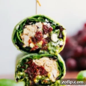 Vibrant Mediterranean Wrap 2 Mediterranean Wrap cut in half and stacked on top of each other.