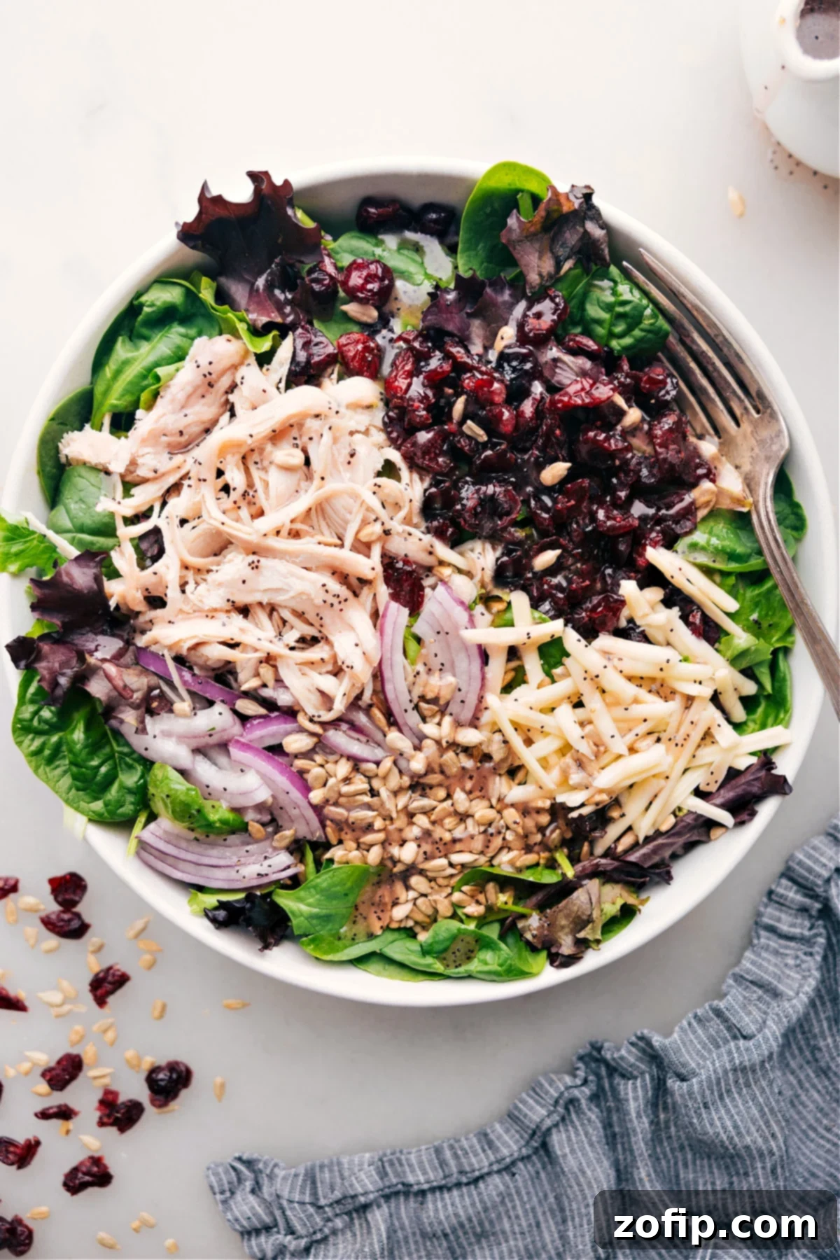 Delicious Turkey Cranberry Salad A beautifully presented Turkey Cranberry Salad with tender turkey, vibrant cranberries, fresh greens, and a creamy dressing.