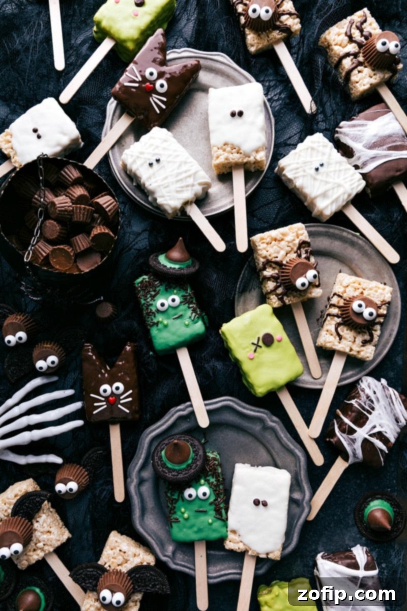 An assortment of Halloween Rice Krispies Treats, decorated in fun and spooky designs.