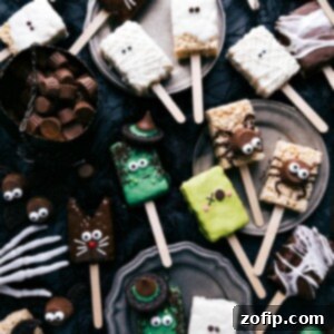 An assortment of Halloween Rice Krispies Treats, decorated in fun and spooky designs.