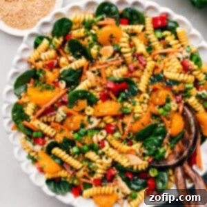 Vibrant Asian Pasta Salad 3 A top-down shot of the finished Asian Pasta Salad, colorful and ready to serve, with a focus on its appealing textures and ingredients.