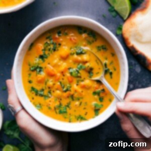 Golden Sweet Potato Coconut Curry 2 A bowl of warm sweet potato coconut curry soup, packed with flavor.
