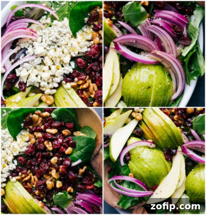 All the colorful and fresh components of the pear salad laid out beautifully on a wooden board before assembly.