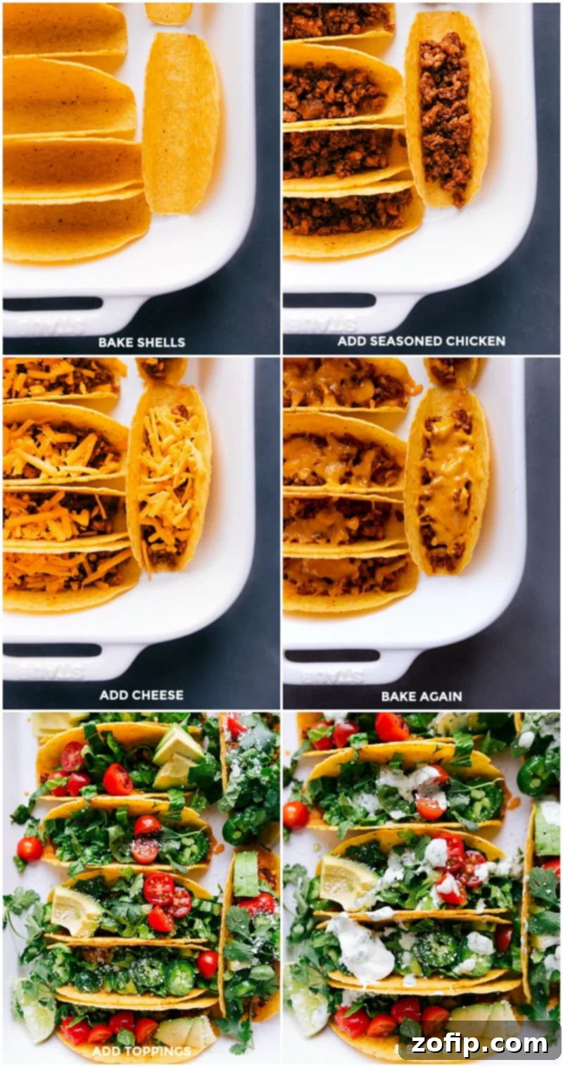 Oven-baked chicken tacos being prepared: crispy corn tortilla shells are generously filled with seasoned ground chicken and topped with shredded cheese. Fresh toppings like avocado slices, diced tomatoes, and cilantro are added after baking, with a final drizzle of cilantro-lime sauce.