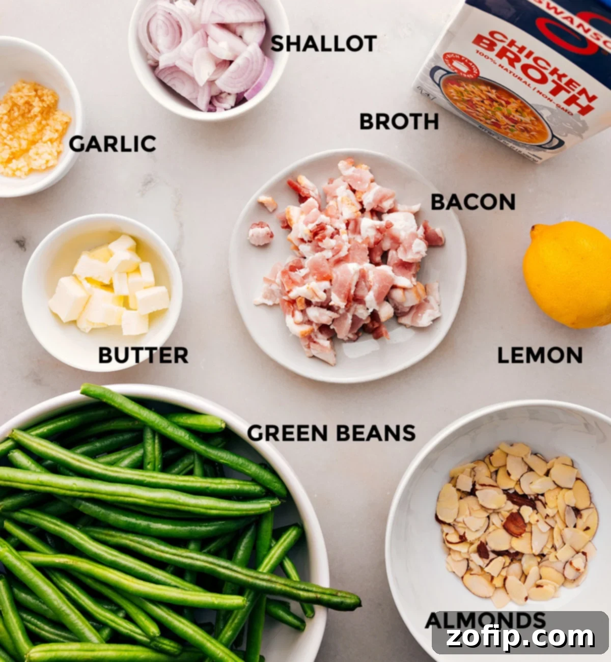 All the ingredients in this recipe—meat, veggies, butter, garlic, broth, lemon, and almonds—are prepped for easy assembly.