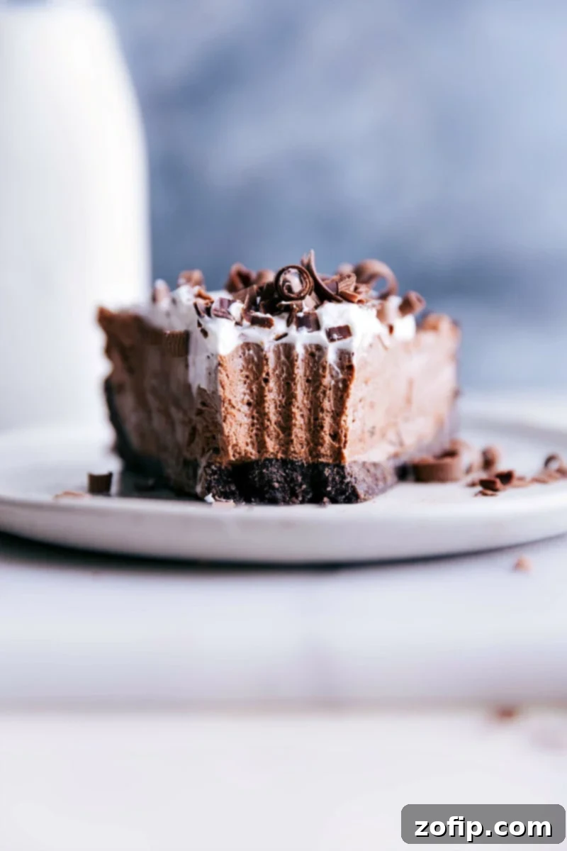 An irresistible slice of dessert with a bite taken out, revealing its delicious layers.