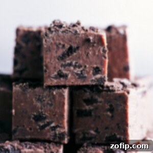 A square image of Chocolate Covered Oreo Fudge ready for serving.