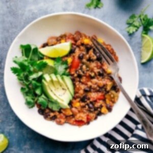 A delicious bowl of freshly cooked Crockpot Quinoa, ready to be garnished and enjoyed.