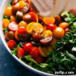 Close-up of a serving of Caprese Quinoa Salad in a white bowl, ready to be enjoyed.