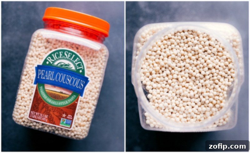 Pearl Couscous Used In This Dish A close-up image of the pearl couscous, also known as Israeli couscous, used in this dish, showing its distinctive larger, round grains.