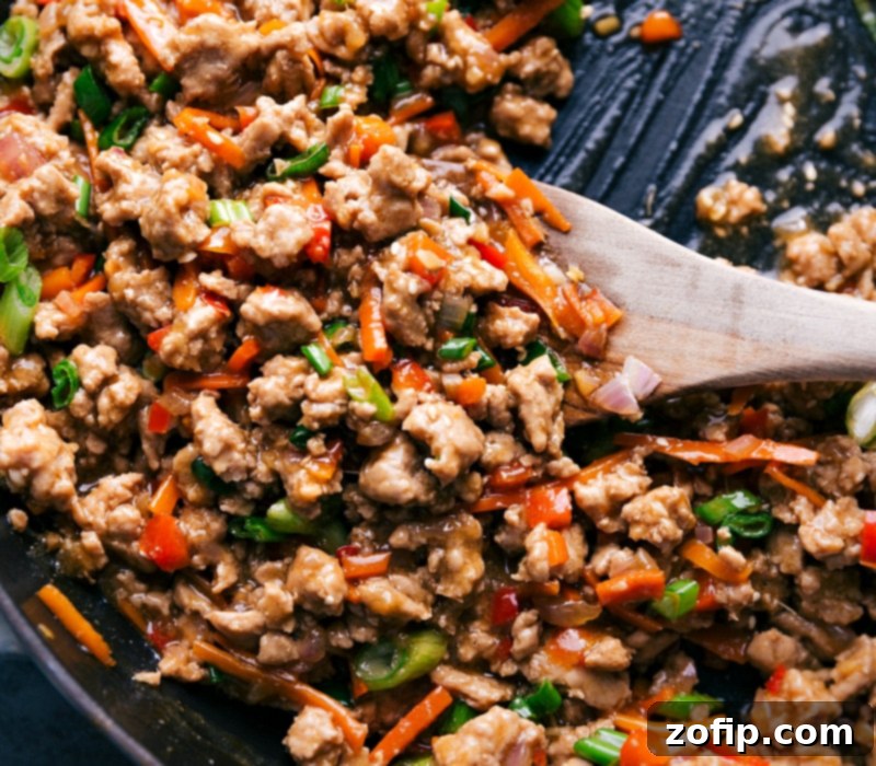 Close-up view of the savory Asian Ground Turkey stir-fry, still in the pan, showcasing its rich color and tender texture, ready to be served.