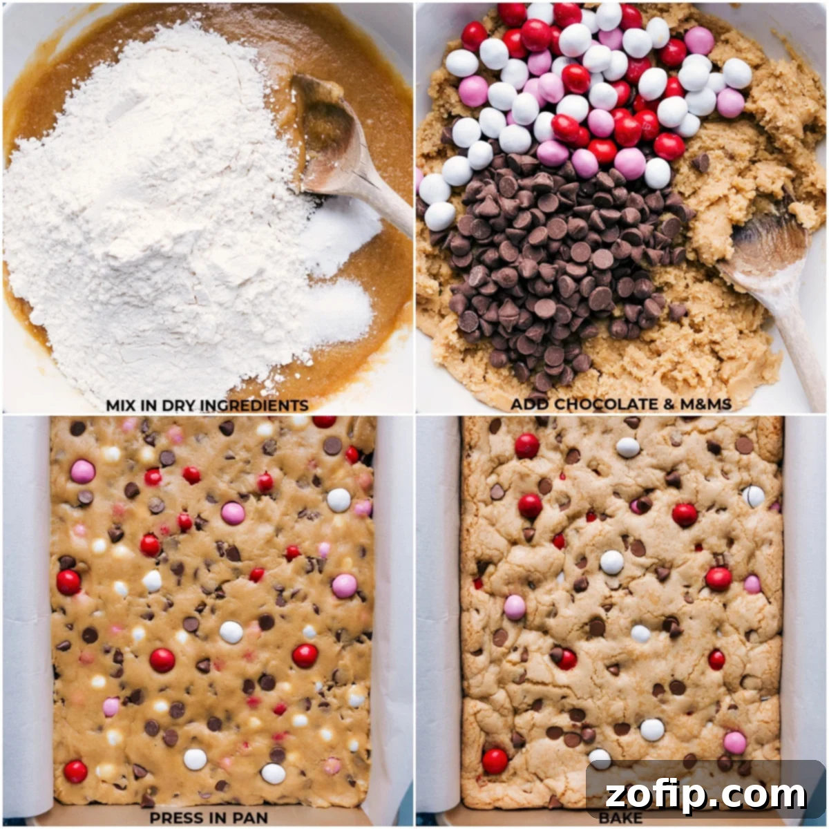 Unbaked M&M Cookie Bars dough in a pan, topped with a scattering of Valentine's Day themed M&Ms, illustrating customization options.