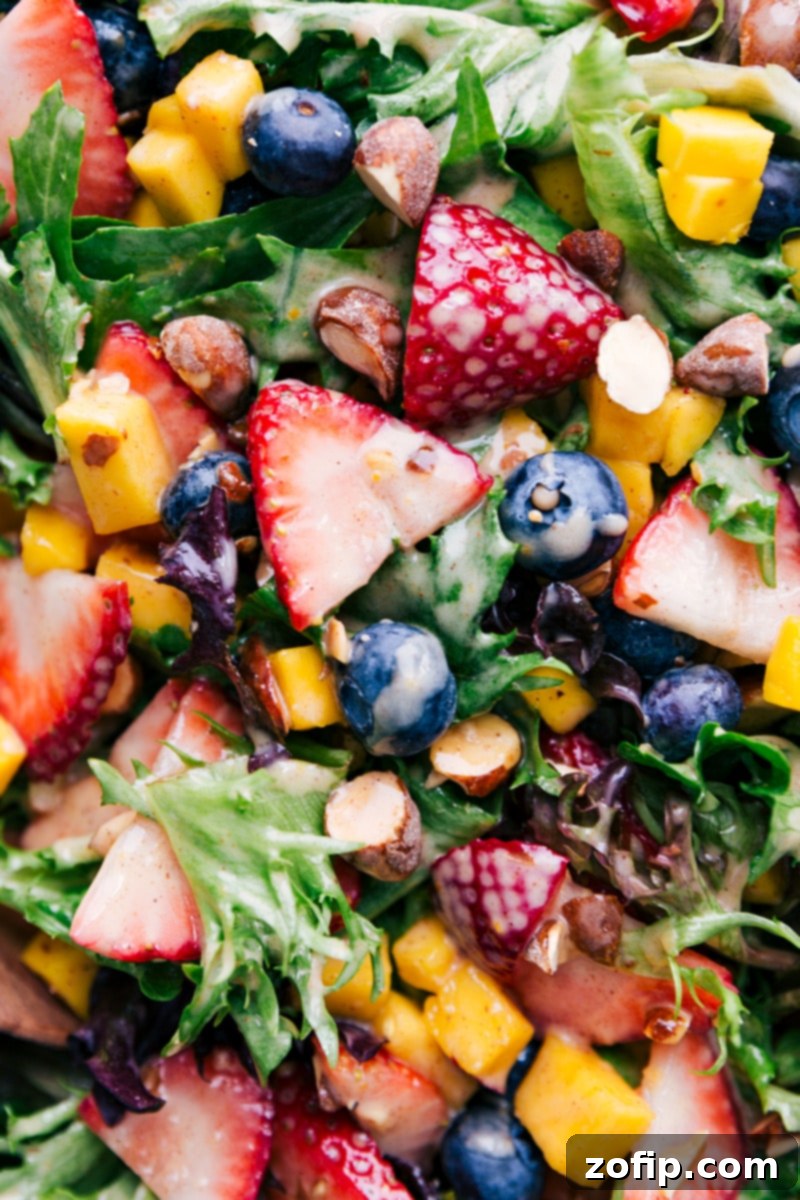 Overhead close-up image of the Mango Salad, beautifully coated with the cinnamon-yogurt dressing.