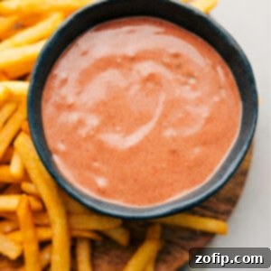 Fry Dipping Sauce 2 A small bowl filled with homemade Fry Sauce, ready to be served as a delicious condiment.
