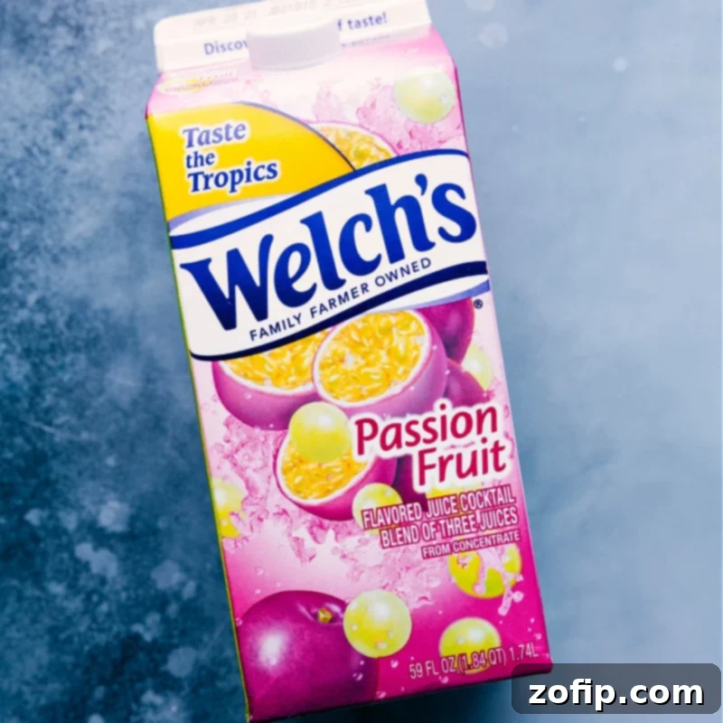 A carton of passion fruit juice, clearly labeled, resting on a kitchen counter, ready for use in the smoothie recipe.