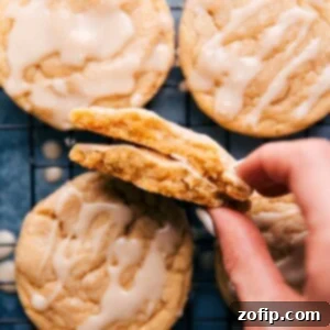 Maple Cookie Perfection 3 Finished maple cookies with glaze on a cooling rack.