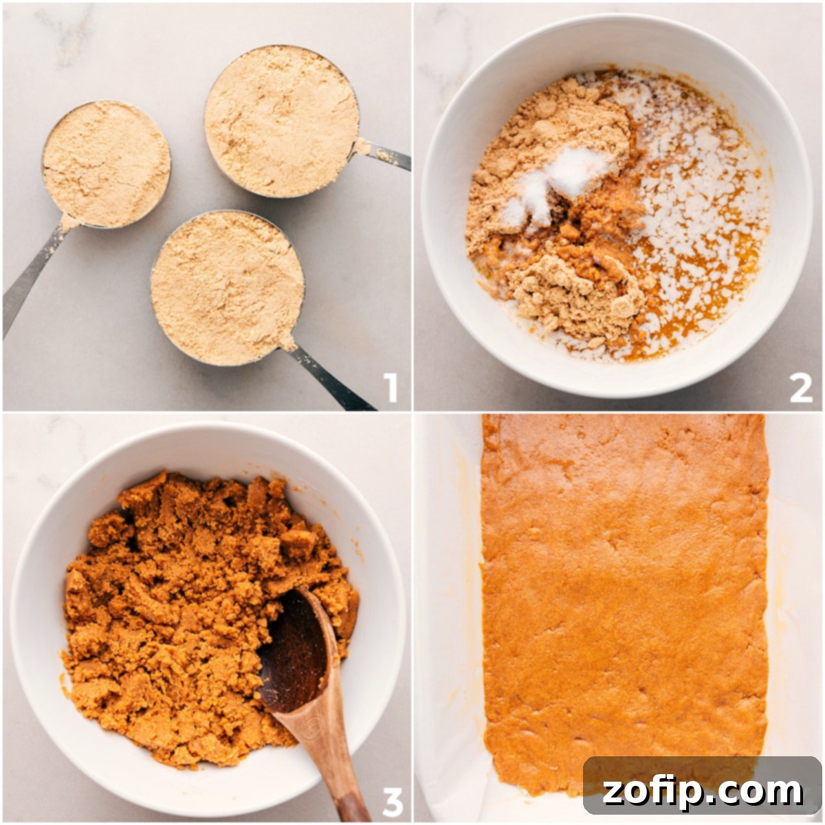 Freshly prepared graham cracker crust, evenly pressed into a baking pan, forming the sturdy base for Magic Cookie Bars.