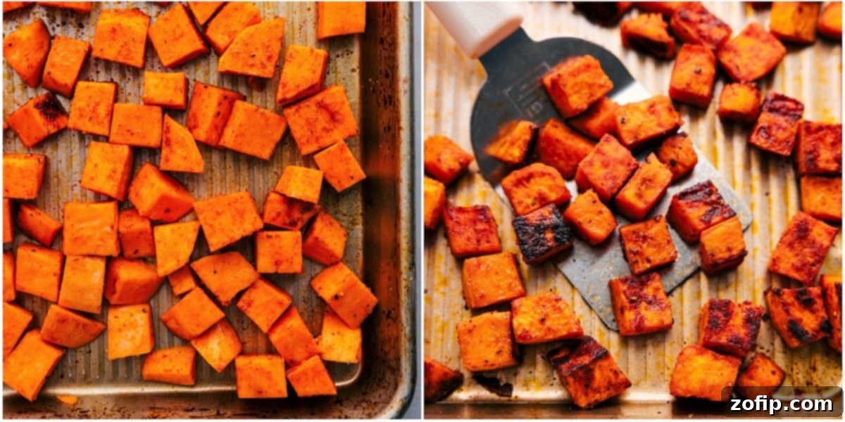 Cubed sweet potatoes, generously seasoned with olive oil, paprika, and garlic powder, roasting evenly on a large sheet pan for the sweet potato quinoa salad, showcasing their golden-brown edges.