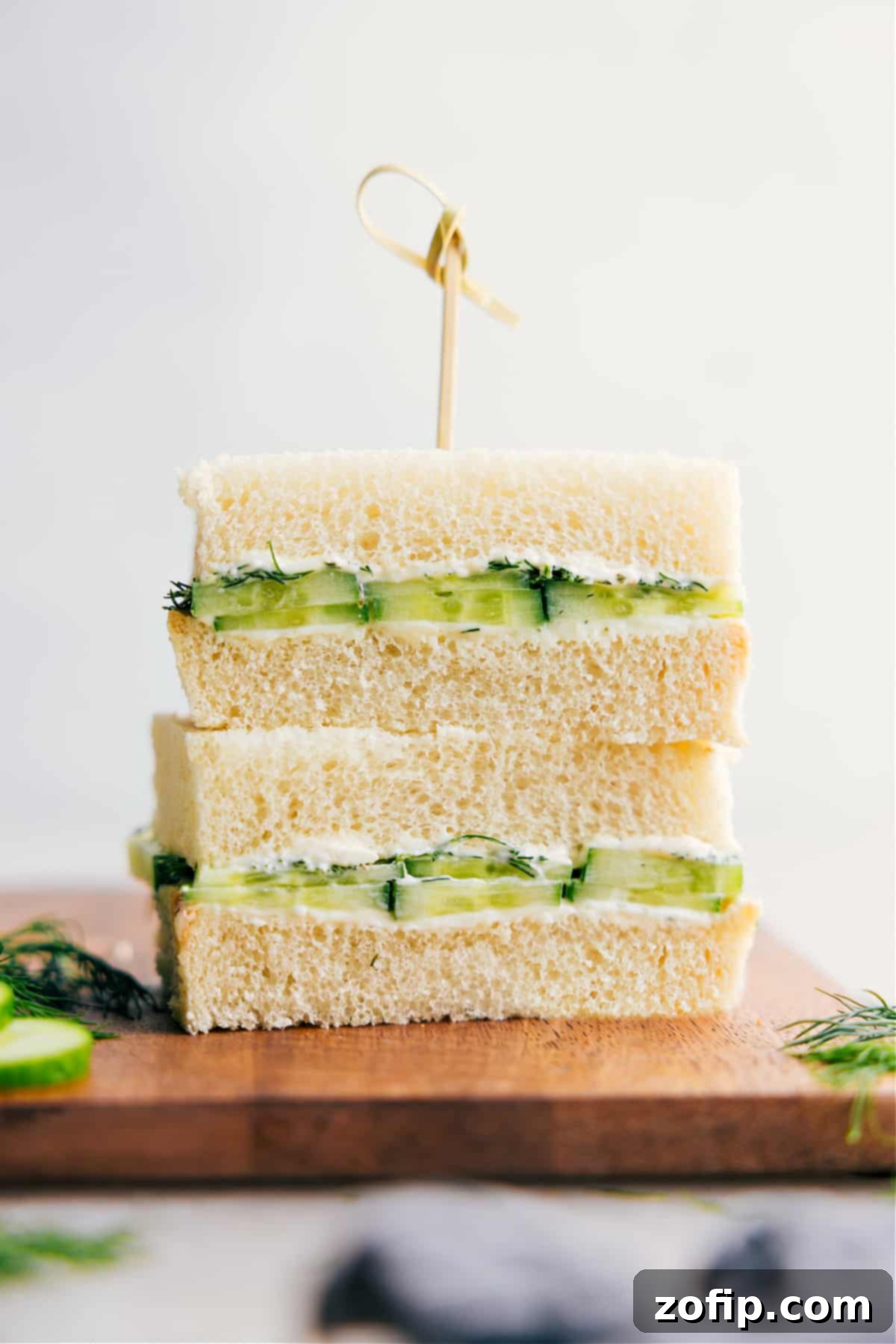 Cucumber Sandwich recipe stacked on top of each other, showcasing fresh ingredients and elegant presentation.