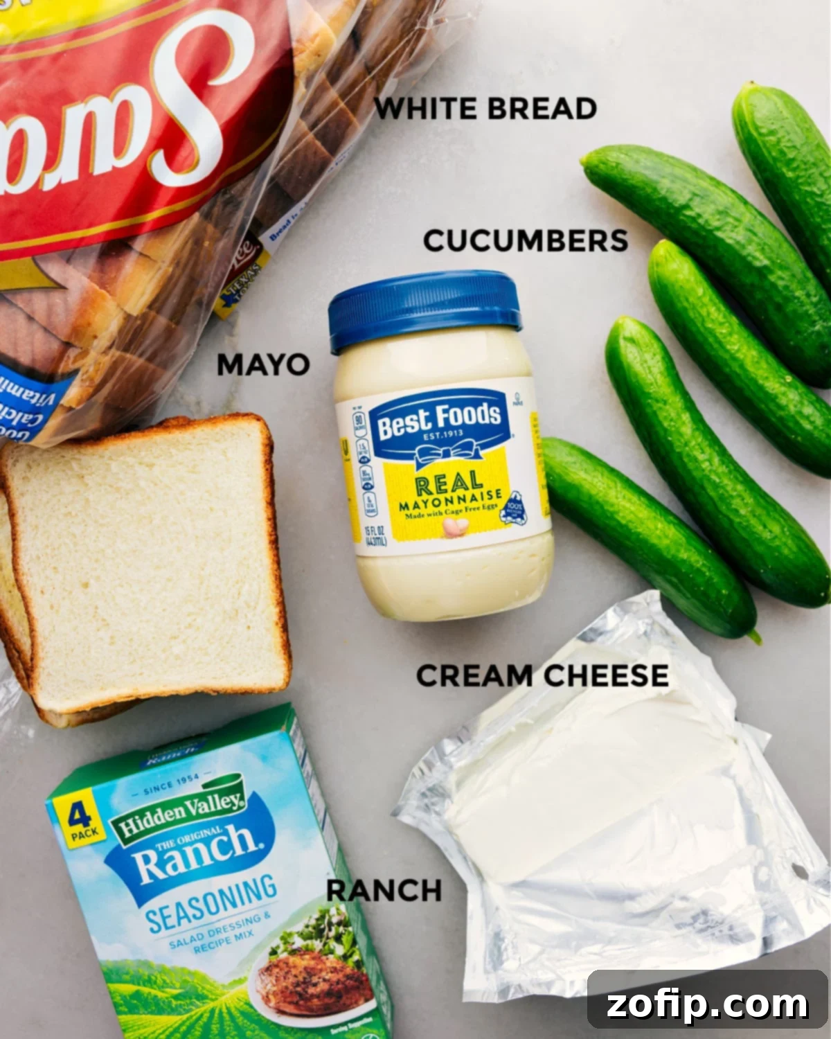 All the ingredients for the cucumber sandwich recipe prepped and laid out for easy assembly.